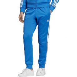 MĘSKIE SPODNIE ADIDAS ORIGINALS SST (XL). Spodnie męskie Adidas, s, bez wzorów, z poliesteru. W wyprzedaży za 219,99 zł.