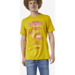 Reebok Classic International Tacos Koszulka Żółty. Żółte podkoszulki męskie Reebok Classic, l, z nadrukiem, z bawełny, z krótkim rękawem. Za 119,95 zł.