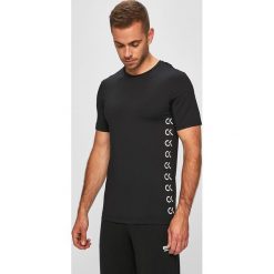 Calvin Klein Performance - T-shirt. Czarne koszulki męskie termoaktywne Calvin Klein Performance, xl, bez wzorów, z elastanu, bez rękawów. W wyprzedaży za 199,90 zł.