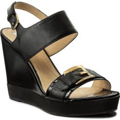 Sandały GEOX - D Janira E D82P6E 08502 C9999 Black. Czarne klapki damskie Geox, z aplikacjami, ze skóry ekologicznej, bez obcasa, na obcasie. W wyprzedaży za 319,00 zł.