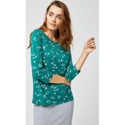 Bluzka z nadrukiem. Bluzki damskie Moodo, s, z nadrukiem, bez kołnierzyka, bez rękawów. Za 15,99 zł.