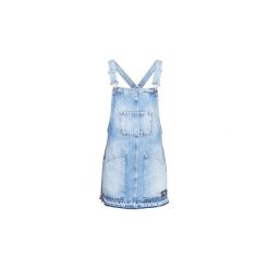 Kombinezony Superdry DENIM DUNGAREE DRESS. Niebieskie kombinezony damskie Superdry, bez wzorów, z denimu, bez kołnierzyka, bez rękawów. Za 319,20 zł.