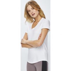 Reebok - Top. Białe topy damskie marki Reebok, s, z elastanu, z okrągłym kołnierzem. W wyprzedaży za 84,90 zł.