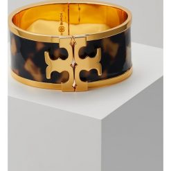 Bransoletki damskie na nogę: Tory Burch RAISED LOGO WIDE CUFF Bransoletka tortoise goldcoloured