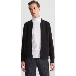 Bluza z prążkowanej dzianiny - Czarny. Czarne bluzy męskie marki Reserved, s, bez wzorów, z dzianiny, bez kołnierzyka, bez rękawów, bez kaptura. Za 139,99 zł.