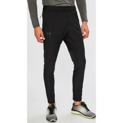 Under Armour - Spodnie Threadborne Vanish. Czarne spodnie męskie Under Armour, s, bez wzorów, z poliesteru, sportowe. W wyprzedaży za 219,90 zł.