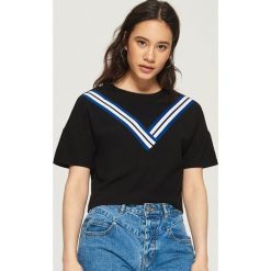 T-shirt z ozdobnymi taśmami - Czarny. Czarne t-shirty damskie Sinsay, l. W wyprzedaży za 19,99 zł.
