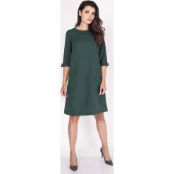 Zielona Sukienka Trapezowa Mini z Uroczymi Kokardkami. Zielone sukienki balowe Molly.pl, do pracy, na jesień, l, z tkaniny, z dekoltem na plecach, mini, oversize. Za 118,90 zł.