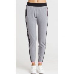 SPODNIE DRESOWE EA7 Emporio Armani. Szare spodnie damskie EA7 Emporio Armani, s, z dresówki. Za 299,40 zł.