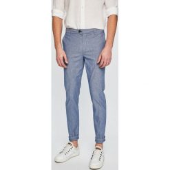 Scotch & Soda - Spodnie. Niebieskie spodnie męskie Scotch & Soda, na co dzień, bez wzorów, z elastanu, casualowe. W wyprzedaży za 269,90 zł.