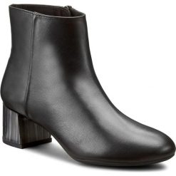 Botki UNISA - Karisiace Black Napasilk B. Czarne botki damskie na obcasie marki Unisa, ze skóry. W wyprzedaży za 389,00 zł.