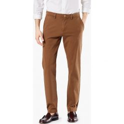 Spodnie chino - Tapered fit - w kolorze jasnobrązowym. Pomarańczowe spodnie męskie DOCKERS, m, w paski. W wyprzedaży za 175,95 zł.