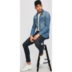 Tommy Jeans - Koszula jeansowa. Niebieskie koszule męskie Tommy Jeans, xl, bez wzorów, z bawełny, klasyczne, z klasycznym kołnierzykiem, z długim rękawem. Za 299,90 zł.