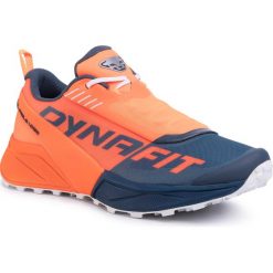 Buty DYNAFIT - Ultra 100 64051 Shocking Orange/Orion Blue 4570. Pomarańczowe buty sportowe męskie Dynafit, ze skóry ekologicznej, bez zapięcia, do biegania. Za 649,00 zł.