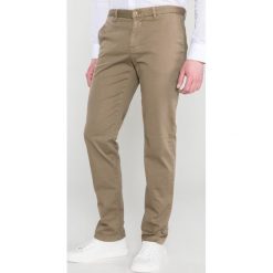 Trussardi Jeans Spodnie Brązowy. Pomarańczowe spodnie męskie Trussardi Jeans, bez wzorów, z elastanu. Za 481,95 zł.