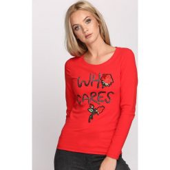Czerwona Bluzka Never Be Ignored. Czerwone bluzki longsleeves marki Born2be, l, z aplikacjami, z okrągłym kołnierzem. Za 24,99 zł.