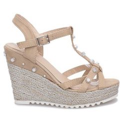 Brązowe Beżowe sandały na koturnie espadryle Chillin. Pomarańczowe espadryle damskie ButyModne, bez wzorów, z materiału, eleganckie, bez obcasa, na platformie, bez zapięcia, trekkingowe. Za 69,00 zł.