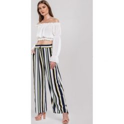 Żółte Spodnie Carry On. Żółte spodnie damskie other, m, z tkaniny. Za 59,99 zł.
