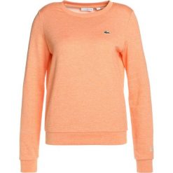 Bluzy sportowe damskie: Lacoste Sport Bluza orange jaspe