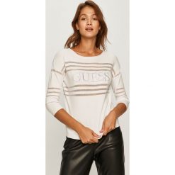 Guess Jeans - Sweter. Białe swetry damskie Guess Jeans, s, z aplikacjami, z poliesteru, bez rękawów, bez kaptura. Za 369,90 zł.