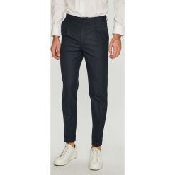 Jack & Jones - Spodnie. Niebieskie spodnie męskie Jack & Jones, na co dzień, z haftami, z elastanu. W wyprzedaży za 89,90 zł.