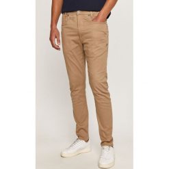 G-Star Raw - Spodnie. Brązowe spodnie męskie G-Star RAW, na co dzień, bez wzorów, z elastanu, retro. Za 599,90 zł.