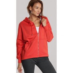 Pomarańczowa Bluza Laririope. Pomarańczowe bluzy damskie Renee, xl, bez wzorów, bez rękawów, bez kaptura. Za 89,99 zł.