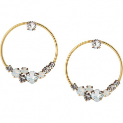 Pozłacane kolczyki-wkrętki z kryształkami Swarovski. Żółte kolczyki damskie marki Destellos, z kryształem, metalowe. W wyprzedaży za 136,95 zł.