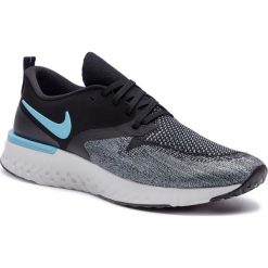 Buty NIKE - Odyssey React 2 Flykint AH1015 002 Black/Bue Fury/Aviator Grey. Niebieskie buty sportowe męskie Nike, ze skóry ekologicznej, bez zapięcia, do biegania. W wyprzedaży za 469,00 zł.