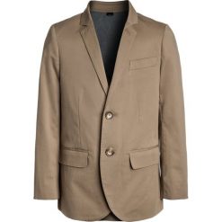 J.CREW ITALIAN STRETCH CHINO JACKET Marynarka khaki. Brązowe spodnie chłopięce J.CREW, z elastanu. W wyprzedaży za 479,20 zł.