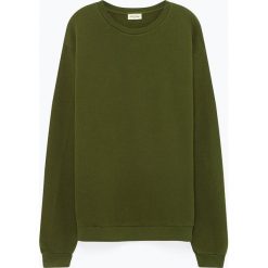 Bluza "Kinibay" w kolorze ciemnozielonym. Zielone bluzy męskie American Vintage, m, bez wzorów, z bawełny, z okrągłym kołnierzem, bez rękawów, bez kaptura. W wyprzedaży za 119,95 zł.