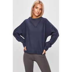 Reebok - Bluza. Niebieskie bluzy damskie Reebok, s, bez wzorów, z bawełny, bez rękawów, bez kaptura. W wyprzedaży za 139,90 zł.
