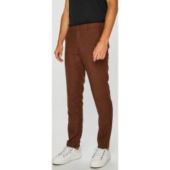 Premium by Jack&Jones - Spodnie. Pomarańczowe spodnie męskie Premium by Jack&Jones, na co dzień, z haftami, z bawełny. W wyprzedaży za 99,90 zł.