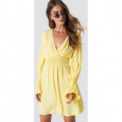 Trendyol Sukienka z marszczoną talią - Yellow. Szare sukienki z falbanami marki Trendyol, na co dzień, z elastanu, casualowe, midi, dopasowane. Za 60,95 zł.