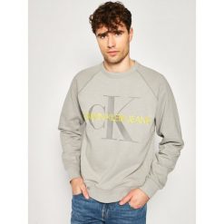 Bluza Calvin Klein Jeans J30J314860. Żółte bluzy męskie Calvin Klein Jeans, m, bez wzorów, z jeansu, bez kołnierzyka, bez rękawów, bez kaptura. W wyprzedaży za 239,00 zł.