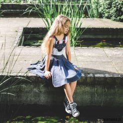 Sukienka z szelkami Wilk. Czarne sukienki dziewczęce marki Pakamera, z bawełny, eleganckie. Za 99,00 zł.