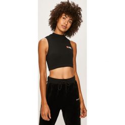 Diesel - T-shirt. Czarne topy damskie Diesel, s, z nadrukiem, z elastanu, z okrągłym kołnierzem. W wyprzedaży za 149,90 zł.