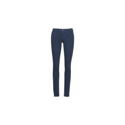 Jeansy slim fit Guess CURVE X. Niebieskie jeansy damskie marki Guess, z aplikacjami, z jeansu. Za 439,00 zł.