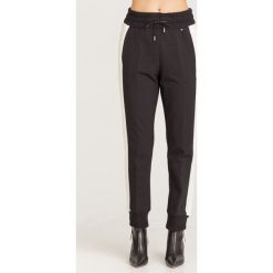 SPODNIE TWINSET. Czarne spodnie damskie Twinset, z materiału. Za 384,50 zł.