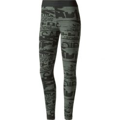 Spodnie dresowe damskie: Adidas Spodnie damskie Sport ID Allover Print czarno-zielone r. XS (BQ9427)