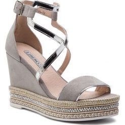 Espadryle LIBERO - 1030 137. Szare espadryle damskie Libero, bez wzorów, ze skóry, bez obcasa, na obcasie. W wyprzedaży za 219,00 zł.