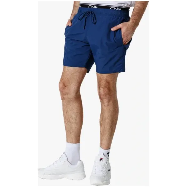 Confront Kąpielówki Baywatch , granatowy, rozmiar L. Niebieskie kąpielówki męskie Confront, m, bez wzorów, z gumy. W wyprzedaży za 79,99 zł.