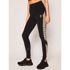 Legginsy Puma CHARLOTTE OLYMPIA Co Tights 596764. Czarne spodnie damskie Puma, s, z elastanu. Za 299,99 zł.