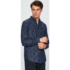 Armani Exchange - Koszula. Niebieskie koszule męskie Armani Exchange, xl, bez wzorów, z bawełny, klasyczne, z klasycznym kołnierzykiem, z długim rękawem. W wyprzedaży za 239,90 zł.
