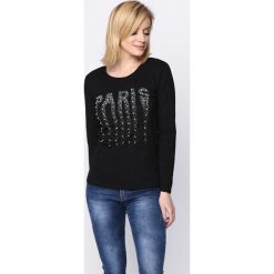 Czarna Bluzka Overrated. Czarne bluzki damskie marki Born2be, s, z aplikacjami, z okrągłym kołnierzem, z długim rękawem. Za 39,99 zł.