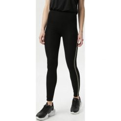 Czarne Legginsy Oceanelle. Czarne legginsy damskie Born2be, uniwersalny, bez wzorów. W wyprzedaży za 24,99 zł.