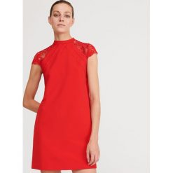 Sukienka mini ze stójką - Czerwony. Czerwone sukienki damskie Reserved, xs, bez wzorów, ze stójką, bez rękawów, mini. W wyprzedaży za 69,99 zł.