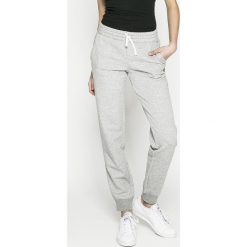 Reebok - Spodnie. Szare spodnie damskie Reebok, s, z bawełny. W wyprzedaży za 129,90 zł.