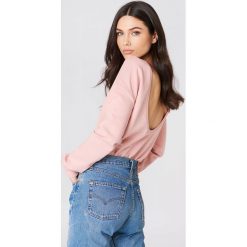 NA-KD Basic Sweter z głębokim dekoltem z tyłu - Pink. Różowe swetry damskie marki NA-KD Basic, bez wzorów, bez rękawów, bez kaptura. W wyprzedaży za 40,47 zł.