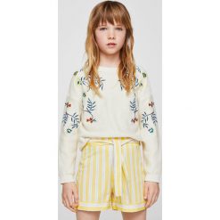 Mango Kids - Szorty dziecięce Matt 110-164 cm. Szare spodenki dziewczęce marki Mango Kids, z bawełny, casualowe. W wyprzedaży za 49,90 zł.